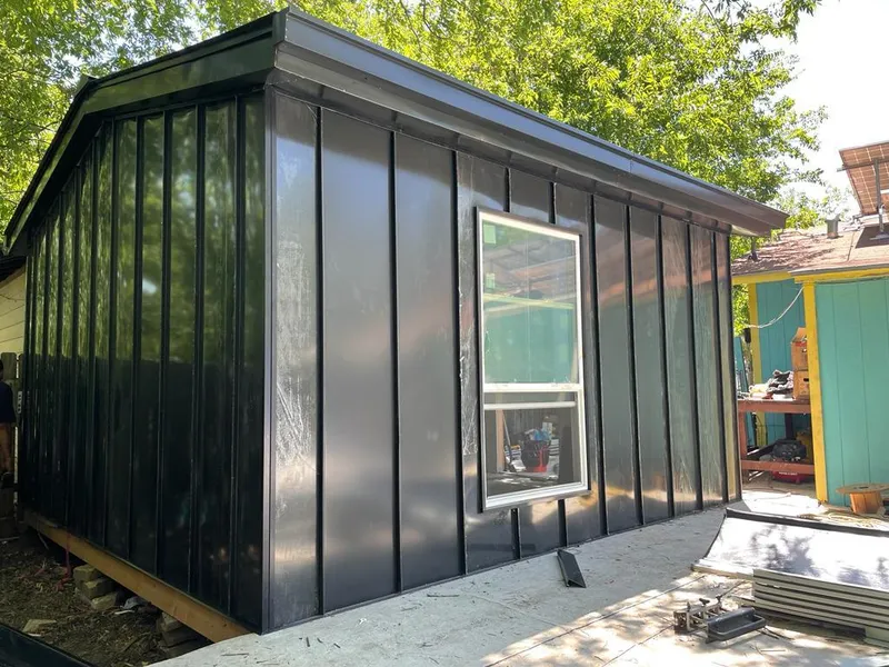 Black standing seam metal wall panels for Roof Inspection in Los Ranchos de Albuquerque